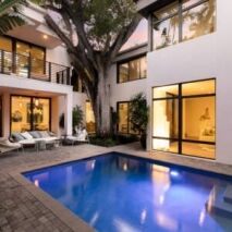 Modern home with large windows maximising natural light and style