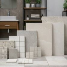Comparison of different tile sizes displayed in a modern bathroom setting, showcasing small mosaics, subway tiles, and large-format tiles