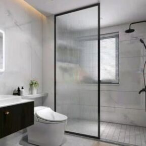 black frame fluted glass panel bathroom
