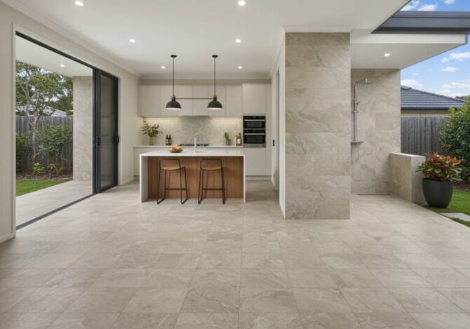 Modern home featuring porcelain and ceramic tiles, with a spacious open-plan kitchen, stylish splashback, durable tiled flooring, and an outdoor patio with stone-look porcelain tiles