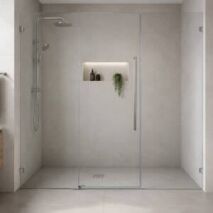 Wall-to-wall frameless shower screen spanning a tiled bathroom alcove in Perth