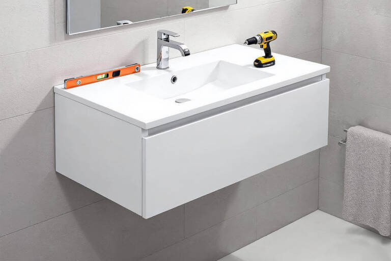 Step-by-step wall hung vanity installation in a modern bathroom, showing fixing brackets, a level tool, and a power drill for a secure and stylish setup.