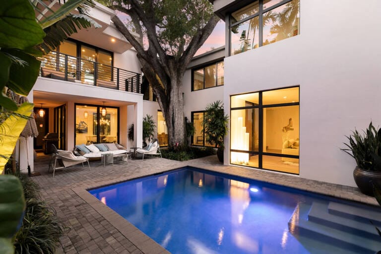 Modern home with large windows maximising natural light and style