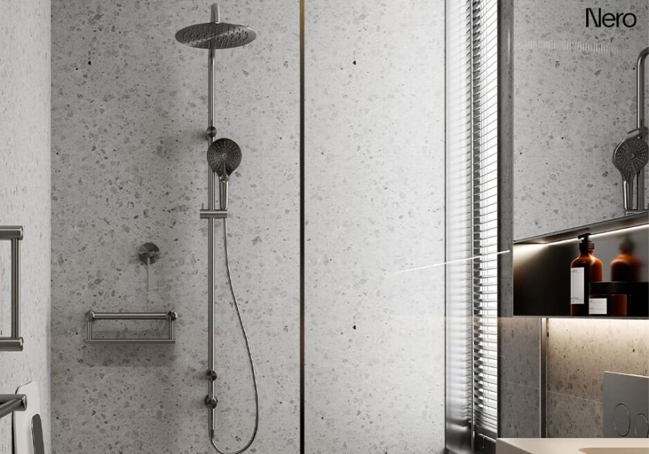 Integrated dual shower system with overhead rainfall shower and handheld shower on a single rail.