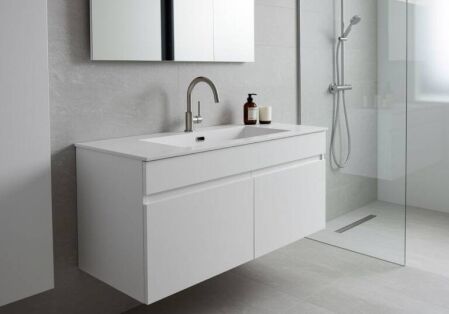 Modern bathroom with wall-hung vanity and integrated sink from Ross’s Discount Home Centre, showcasing a sleek and functional sink and cabinet combo