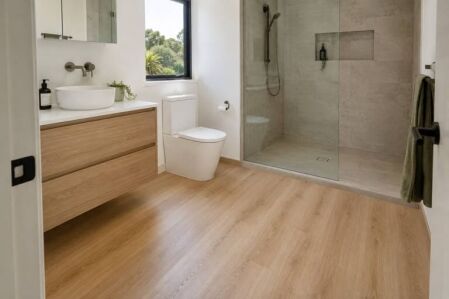Hybrid flooring in the dry area of a Perth bathroom with a separate tiled shower