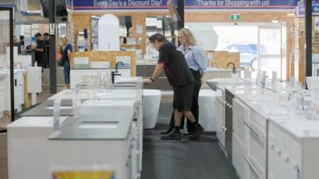 Customer browsing bathroom supplies in Ross’s Discount Home Centre Perth showroom – trusted local bathroom supplies Perth
