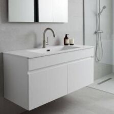 Modern bathroom with wall-hung vanity and integrated sink from Ross’s Discount Home Centre, showcasing a sleek and functional sink and cabinet combo