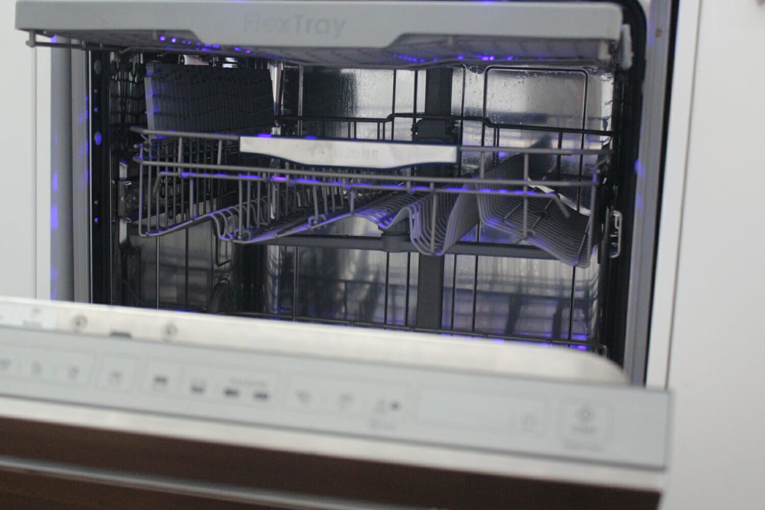load a dishwasher