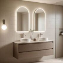 LED arched mirrors above floating vanity