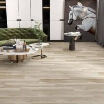 Wood look tiles in modern living room with green sofa and marble coffee table