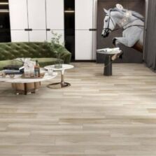 Wood look tiles in modern living room with green sofa and marble coffee table