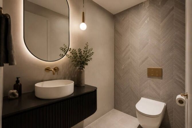 Stylish small powder room in a Perth home with space-saving fixtures